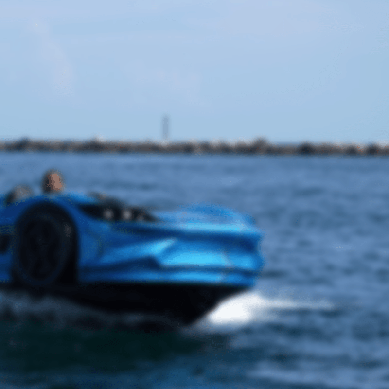 a close up of a boat next to a body of water